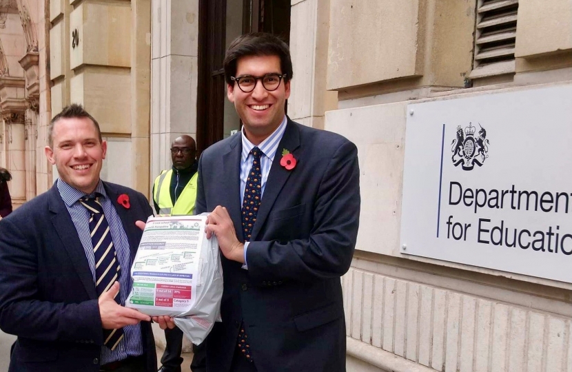 Ranil Jayawardena MP (right) and Revd Dr Chris Evans handing in their application at the Department for Education.